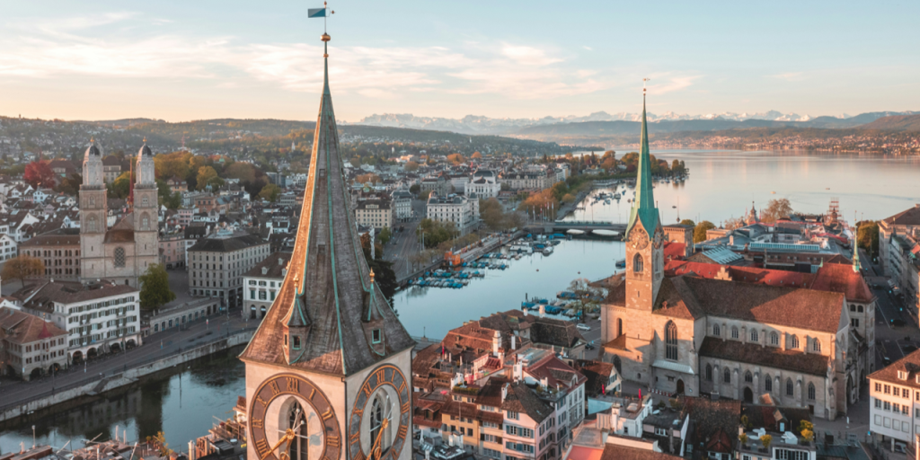 Learn what companies need to know when relocating talent to Switzerland — from permits and quotas to family support, housing, and 2025–2026 mobility trends.